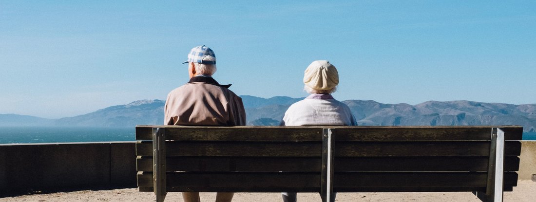 elderly couple on bench